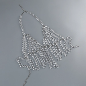 Detail of beaded halter body chain with silver fringe crystals for evening dresses