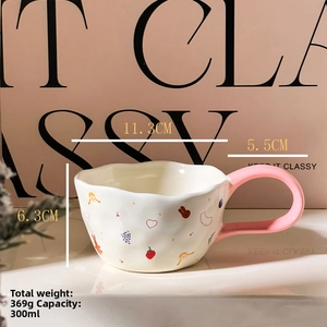 Detail of pink ceramic bear mug with 300ml capacity and 11.3cm wide rim specifications