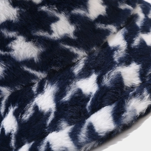 Blue houndstooth faux fur bucket hat with thick plush texture for winter warmth