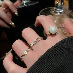 Elegant 18K gold plated pearl and zircon ring set for women featuring luxury floral design