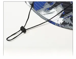 Detail view of adjustable windproof chin strap with toggle on camo sun hat