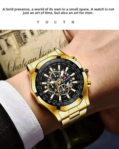 Close-up of luxury gold steel men's watch with black chronograph dial and luminous hands
