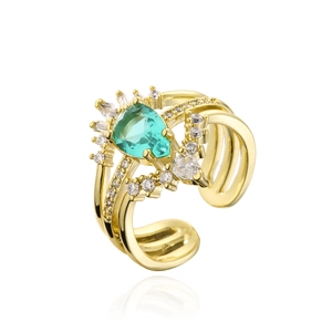 Three-layer 18K gold ring with pear-shaped emerald zircon and white crystals on white background