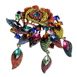Baroque floral brooch with colorful rhinestones and crystal leaf drops on bronze base