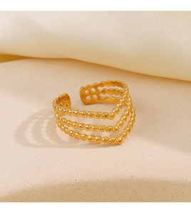 Detailed close-up of triple-layered V-shaped 18K gold-plated beaded stackable open ring