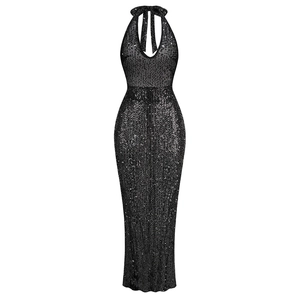 Detail view of the halter neck design and shimmering black sequins on the dress