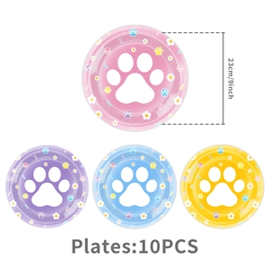 Detail view of 9-inch dog paw print party plates in pink, purple, blue and yellow