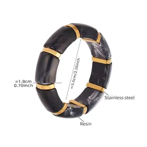 Detail showing marble resin segments and golden stainless steel links with size specs