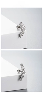 Detail of silver zirconia ear climber with star and marquise cut stones and screw back