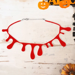 Red Halloween bleeding choker necklace with adjustable silver chain on festive background