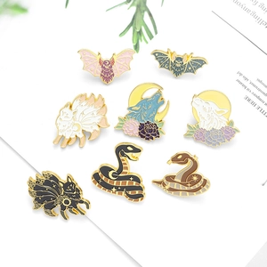Enamel animal brooches set with wolf, fox, bat and snake designs in zinc alloy