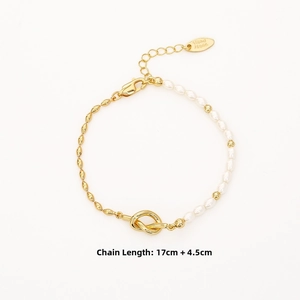 Detail of knot design mixed pearl and gold link chain bracelet with 17cm+4.5cm length