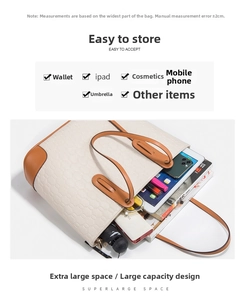 Internal view of a large tote bag showing space for iPad, umbrella and cosmetics