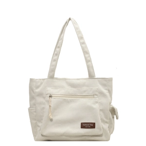 Large off-white corduroy tote bag for women featuring front zipper pocket and shoulder straps