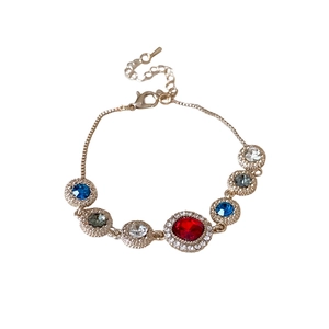 Elegant gold bracelet with sparkling multi-color round crystals and lobster clasp