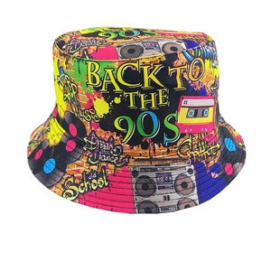 Close-up of graffiti bucket hat featuring retro 90s prints and Break Dance lettering