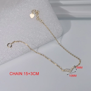 Detailed size view of gold V-shaped bracelet with 15+3cm chain length and crystal inlay
