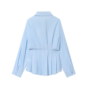 Back view of light blue long sleeve women shirt with ruched waist and pleated hem detail