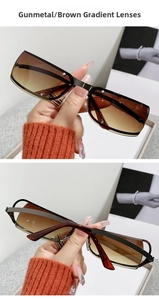 Detail view of gunmetal frame sunglasses with gradient brown lenses in steampunk style