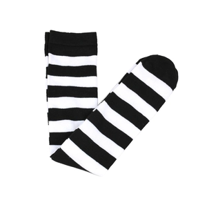 Macro detail of high-quality knit texture on classic black and white striped stockings