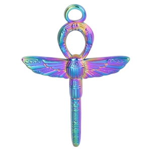 Macro shot of iridescent Ankh cross and winged scarab pendant in polished stainless steel