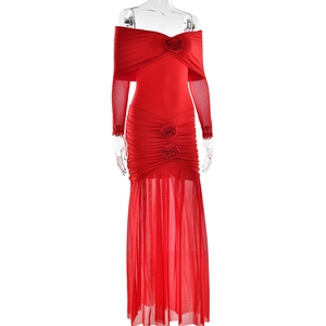 Detail view of red off-shoulder dress with 3D rose ornaments and pleated mesh fabric
