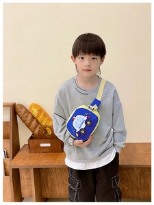 Detailed view of kids cartoon car chest bag with adjustable strap and contrast blue yellow colors