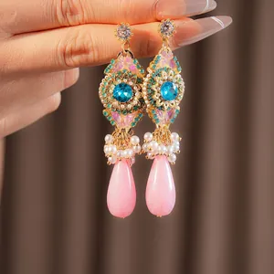 Boucles d'oreilles vintage en zircon avec saphir bleu et perles roses en goutte