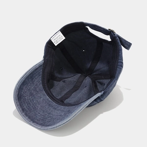 Navy blue washed cotton baseball cap with HELLO embroidery and vintage distressed finish