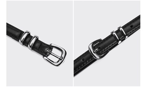Detail of black leather belt with silver pin buckle and dual textured metal loops