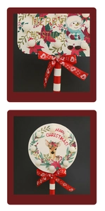 Detail of Christmas STOP sign LED light post with snowman and reindeer illustrations