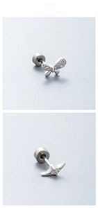 Detail of silver butterfly earring with cubic zirconia and flat back screw design