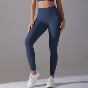 Close-up of high-waist seamless compression yoga leggings in deep blue with tummy control