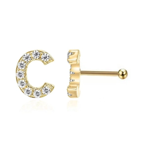 Golden C-shaped letter nose stud with cubic zirconia and screw back detail on white background