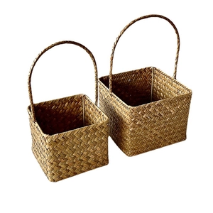 Set of two square seagrass woven baskets with handles for gift or flower display
