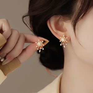 Elegant snowflake pearl stud earrings with gold base and zircon stones for women