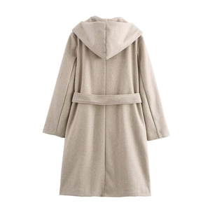 Rear view of long hooded wool coat in oatmeal beige with waistband and seam details
