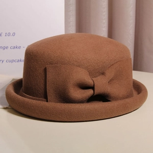 Elegant French wool felt cloche hat in deep brown with a large side bow for women