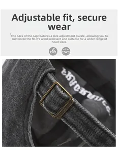 Detail of adjustable metal buckle on vintage washed cotton baseball cap for a custom fit