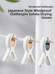 Detail of durable windproof laundry clips with non-slip rubber pads for drying bedsheets