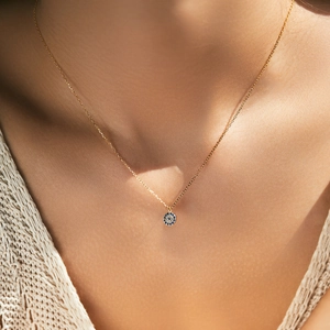 Elegant s925 silver evil eye pendant necklace with sparkling zircons on a female model