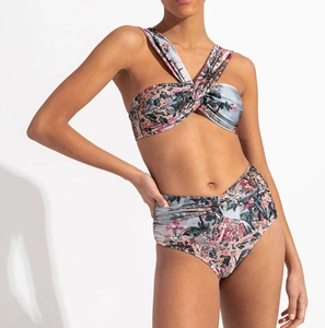 Detail of grey-blue floral bikini set with twisted bust and high-waisted bottoms
