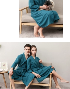 Detail of teal waffle weave bathrobe showing texture and couple styling in home setting