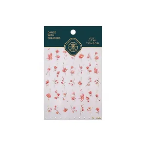 Pink floral nail art stickers with gold foil outline on white background