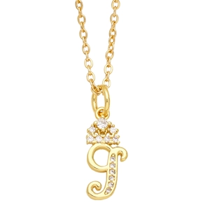 Close-up of gold initial necklace with crown motif and sparkling zircon stones