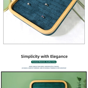 Bamboo jewelry tray with green velvet slots for rings and studs display