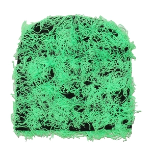 Close-up of neon green and black distressed knit beanie with long fringe texture