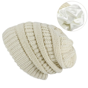 Winter knit beanie with satin lining and thick texture for hair protection in off-white