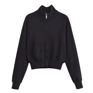 Detail of black cotton zip-up sweatshirt featuring stand collar and ribbed cuffs design