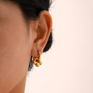 Elegant 18K gold plated flower dangle earrings featuring a 3D petal design on hoops